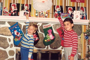 Samuel & Simon, pointing to their pictures, so that Santa recognizes them and puts presents in their Christmas socks..