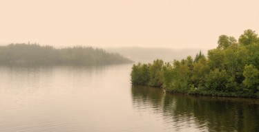 Hazy, soft light on the lake at the end of a warm day.