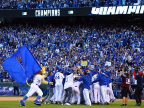 The Kansas City Royals celebrate their 2 to 1 win over the Baltimore Orioles to sweep the series in Game Four of the American League Championship Series at Kauffman Stadium on October 15, 2014 in Kansas City, Missouri.