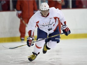 Washington Capitals star Alex Ovechkin skates hard during a training-camp drill on Sept. 19, 2014, in Arlington, Va.