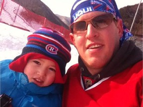 Andy Regan, a Canadiens fan who grew up in New Brunswick but has been living in South Korea for the last 11 years, poses for photo with his son, River. Regan and his family live in Taebaek, South Korea, but he still follows the Habs religiously on the Internet and through the Montreal Gazette's hockeyinsideout.com website.