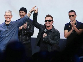 Maybe we got a little carried away, Bono says of U2's collaboration with Apple.