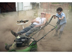 Bill Murray, left, and Jaeden Lieberher are pictured in a scene from the film, St. Vincent.