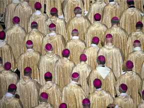 Bishops attend the beatification ceremony of Pope Paul VI, and a mass for the closing of of a two-week synod on family issues, celebrated by Pope Francis, in Saint Peter's Square at the Vatican, Sunday, Oct. 19, 2014.