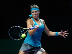 Westmount's Eugenie Bouchard in action against Ana Ivanovic of Serbia at the BNP Paribas WTA Finals in Singapore on Oct. 22, 2014.