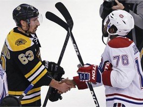 The Bruins' Brad Marchand shakes hands with the Canadiens' P.K. Subban after Game 7 of a second-round Stanley Cup playoff series in Boston on May 14, 2014. The Canadiens won 3-1, advancing to the Eastern Conference final against the New York Rangers.