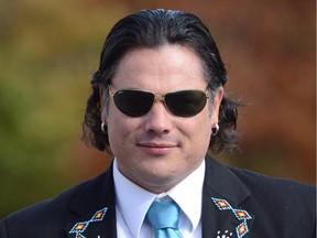 Senator Patrick Brazeau arrives at the Senate in Ottawa on Oct. 22, 2013. The suspended senator was arrested again Monday, this time for alcohol-related offences. THE CANADIAN PRESS/Sean Kilpatrick
