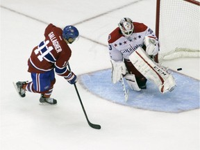 The Canadiens' Brendan Gallagher  scores the winning goal on Capitals goalie Braden Holtby during a shoutout on Thursday, Oct 9, 2014 in Washington. The Canadiens won 2-1.