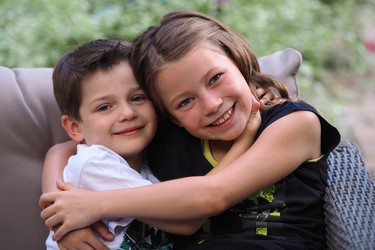 Brother and Sister hugs, priceless.