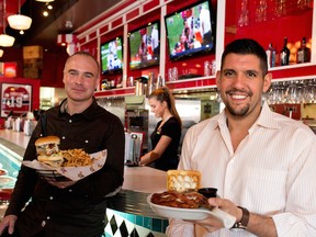 Marc Emond, left, holds the Tower Burger and Elan Azran hold the Southern Comfort.