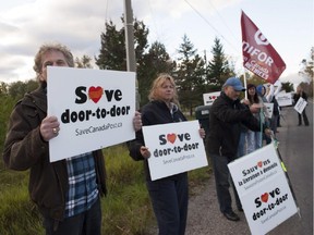 Despite protests from Canada Post unions, the government agency is going ahead with planned cuts to home delivery.