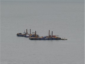 Two barges conduct seismic tests in the St-Lawrence River, off Cacouna village, Sept. 23, 2014 .