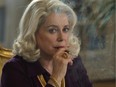 Catherine Deneuve looks a little disengaged as Renée Le Roux, a casino owner, in L'Homme qu'on aimait trop.