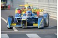 E. Dams-Renault Formula E Team driver Nicolas Prost of France (front) competes during the Formula E race near the Bird’s Nest stadium in Beijing on Sept. 13, 2014. The electric cars can hit a top speed of 220 km/h. AFP PHOTO / GOH CHAI HINGOH CHAI HIN/AFP/Getty Images