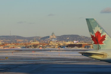 "....on my way home, arriving at Pierre Elliott Trudeau Airport, I could not help but notice St- Joseph's Oratory."  Home Sweet Home