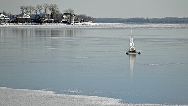 Shot from Pointe-Claire sailing club with #30 bridge behind Valois Bay.