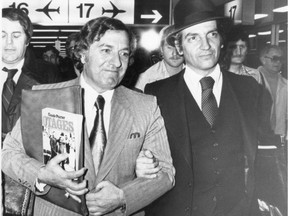 Frank Cotroni, left, arrives at Dorval airport in 1979 after being released from a penitentiary in Lewisburg, Pa., where, it was alleged, he and other mobsters plotted to kill two U.S. judges, including Warren Burger.