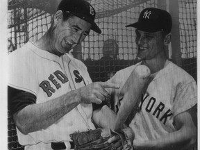 Boston Red Sox's Ted Williams, left, and New York Yankees' Roger Maris, talk at the 1960 All-Star Game.