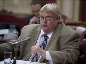 Quebec Health Minister Gaetan Barrette, pictured here at the beginning of a legislature committee on health reform 10 days ago, says anglophone and bilingual health institutions will continue be protected under Bill 10.