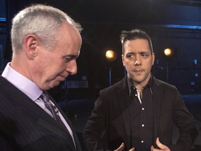 George Stroumboulopoulos (right) and Ron MacLean attend an event where Rogers TV unveiled their team for the station's NHL coverage in Toronto on Monday, March 10, 2014. Stroumboulopoulos debuted as the host of Hockey Night in Canada on Saturday night, anchoring Sportsnet's new interpretation of the venerable TV franchise in spite of the apparent displeasure of long-time host MacLean and partner Don Cherry. THE CANADIAN PRESS/Chris Young