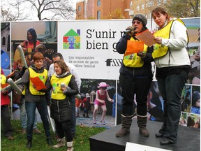 Home daycare workers clamoured for a pay raise Friday, Oct. 24, 2014, outside Quebec's family ministry.