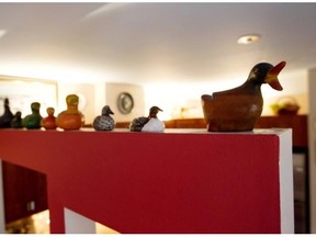 Ducks atop a dividing wall between the dining and living rooms in Renee Lescop's condo Thursday, August 28, 2014 in Montreal. Her ground floor condo is one of a group of apartments built a century ago.