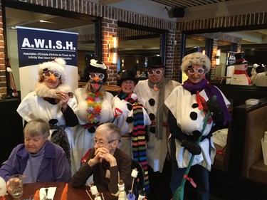 AWISH (Athritis West Island Self Help) having a fun in the winter get-together with a Snowman party.