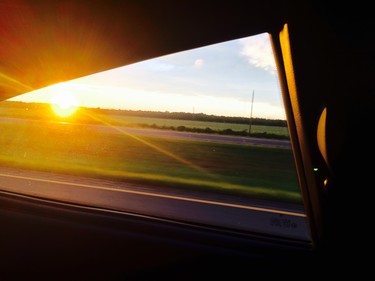 Driving in to Vaudreuil this summer. Couldn't stop to take a pic so I turned quickly and snapped this shot through the backseat.