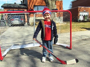 4 year old Gabi loves playing hockey with his dad and rooting for the Canadians...Go-Habs-Go !!