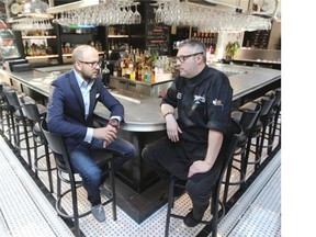 Owner Torrance Ragueneau, left, and chef Jean-François Vachon sit at the bar at Thursdays Bistro in Montreal on, yes, a Thursday.