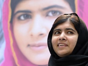 FILE - In this file photo taken Friday, Oct. 11, 2013, Malala Yousafzai speaks about her fight for girls' education on the International Day of the Girl at the World Bank in Washington.  Teenage activist Malala Yousafzai has jointly won the Nobel Peace Prize for her "heroic struggle" for girls' rights to education, it is announced Friday Oct. 10, 2014.