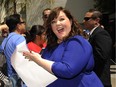Melissa McCarthy, co-writer and star of the new film "Tammy," signs autographs for fans following a hand and footprint ceremony for her at the TCL Chinese Theatre on Wednesday, July 2, 2014 in Los Angeles.