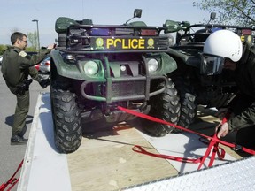 Police officers prepared to search for Anne Lapointe's body in 2004.