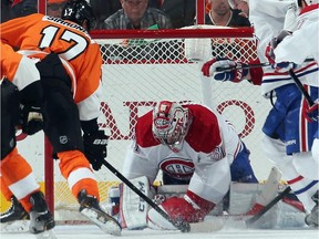 Canadiens goalie Carey Price makes a save on Wayne Simmonds of the Philadelphia Flyers at the Wells Fargo Center on Dec. 12, 2013.