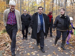 Montreal Mayor Denis Coderre (centre) meeting with the Green Coalition at Bois de Liesse Park, Saturday Oct. 25, 2014.