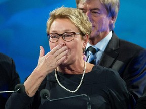 Former Parti Quebecois leader Pauline Marois blows a kiss to supporters after announcing she is stepping down as PQ leader following her party's loss April 7, 2014.