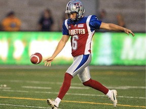 Alouettes kicker Sean Whyte punts during CFL against the Edmonton Eskimos in Montreal on Aug. 08, 2014.