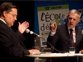 Denis Coderre, left, and Marcel Côté, during the first Montreal mayoralty debate on Aug. 16, 2013.