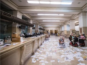 A view of the inside of Montreal city hall after demonstrators protesting the proposed Bill 3, a pension reform bill, stormed in and littered the building and disrupted city council in Montreal on Monday, August 18, 2014.