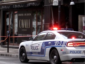 MONTREAL, QUE.: MAY 27, 2014 -- Arson is suspected in the firebombing of Restaurant Cavalli, a Peel St. hot spot that has had its liquor licences and restaurant permit suspended for 100 days for various infractions, in Montreal, on Tuesday, May 27, 2014.  (Dave Sidaway / THE GAZETTE) ORG XMIT: 50072