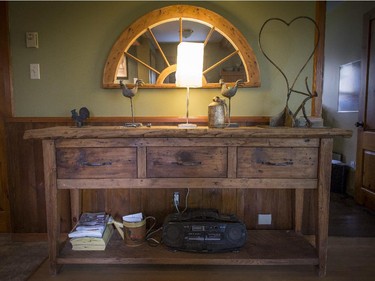 A buffet table made from reclaimed wood at the the Rigaud home of Roger Brabant.