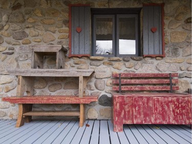 Stools and a chest made from reclaimed wood at the the Rigaud home of Roger Brabant.