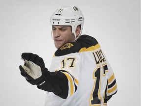 The Boston Bruins' Milan Lucic yells at a referee after coming out of the penalty box  late in the third period of a 6-4 loss to the Canadiens at the Bell Centre on Oct. 16, 2014.  Lucic was given a misconduct for his actions.
