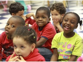 Pre-kindergarten students from the Commission scolaire de Montréal look pretty happy in a class at St. Dorothy School in St.-Michel.
