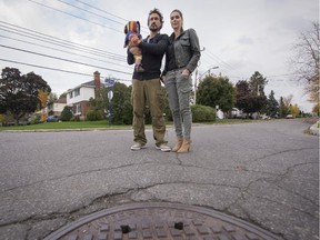 Marie-Pierre David and Luc Patrie find they were living next to "stinky corner," as local children call it in Pointe Claire. The odours coming from the sewers has been around for years and the city has done nothing to combat it. Friday, October 17, 2014.