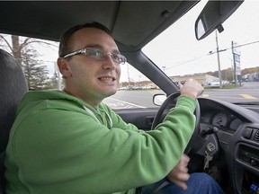 Tyler Fitzsimons, setting his eyes on the prize of 2014 edition of Canada's Worst Driver, merges into traffic on Île-Perrot Saturday, October 18, 2014.