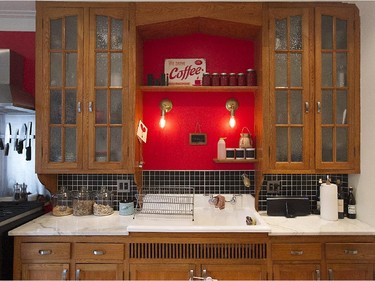 Original wood cupboards in the kitchen.