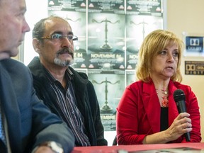 Parents of murder victim Denis Roux-Bergevin, Nicole Roux, right, and François Bergevin, left, during a news conference for the documentary film Novembre 84' at Cinéma Beaubien in Montreal on Tuesday, October 28, 2014.