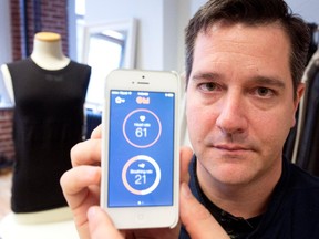 Stéphane Marceau, CEO of OMsignal, displays his heart rate via an iPhone app in Montreal on Tuesday October 28, 2014. The company is developing a line of biometric shirts for the fitness market that sync with the iPhone.