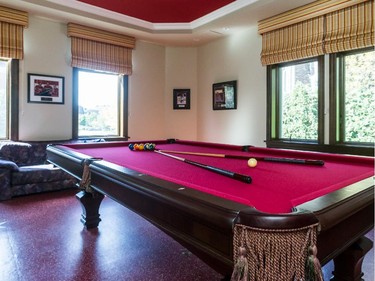 Hockey memorabilia adorn the walls of the billiard room in this $12-million mansion on Nun's Island in Verdun, on Friday, Oct. 3, 2014.